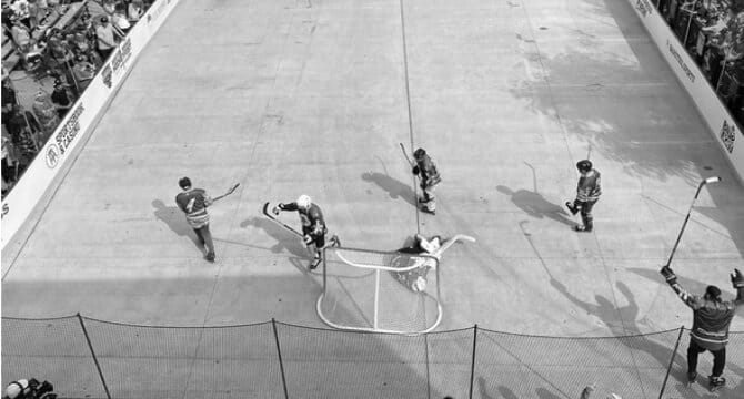 People playing ball hockey
